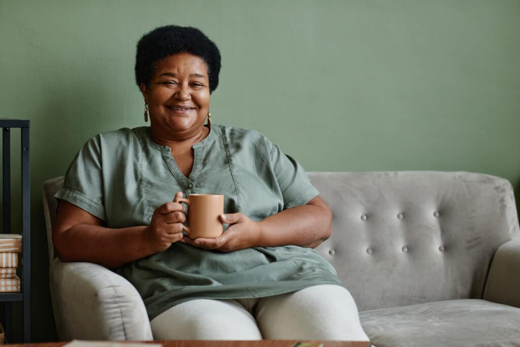 Black Senior Woman Enjoying Coffee